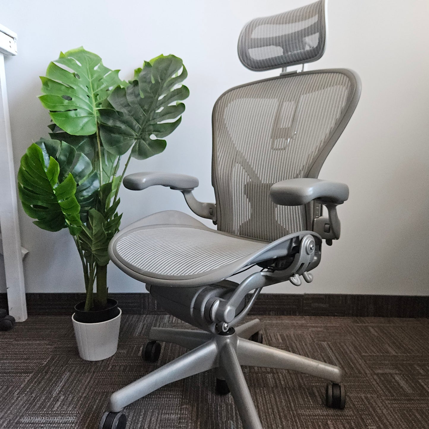 Herman Miller aeron with headrest